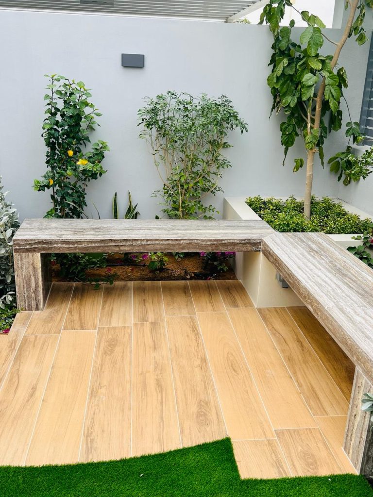 Indoor plants arrangement in a modern Dubai office reception by MasterMaint