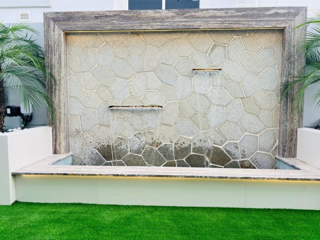 Swimming pool contractors in Dubai designing custom water features and fountains